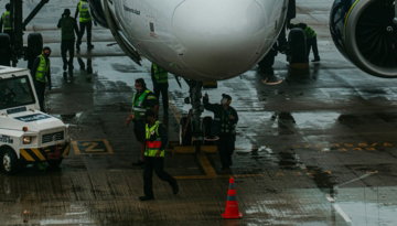 a-large-jetliner-sitting-on-top-of-an-airport-tarmac.jpg a large jetliner sitting on top of an airport tarmac